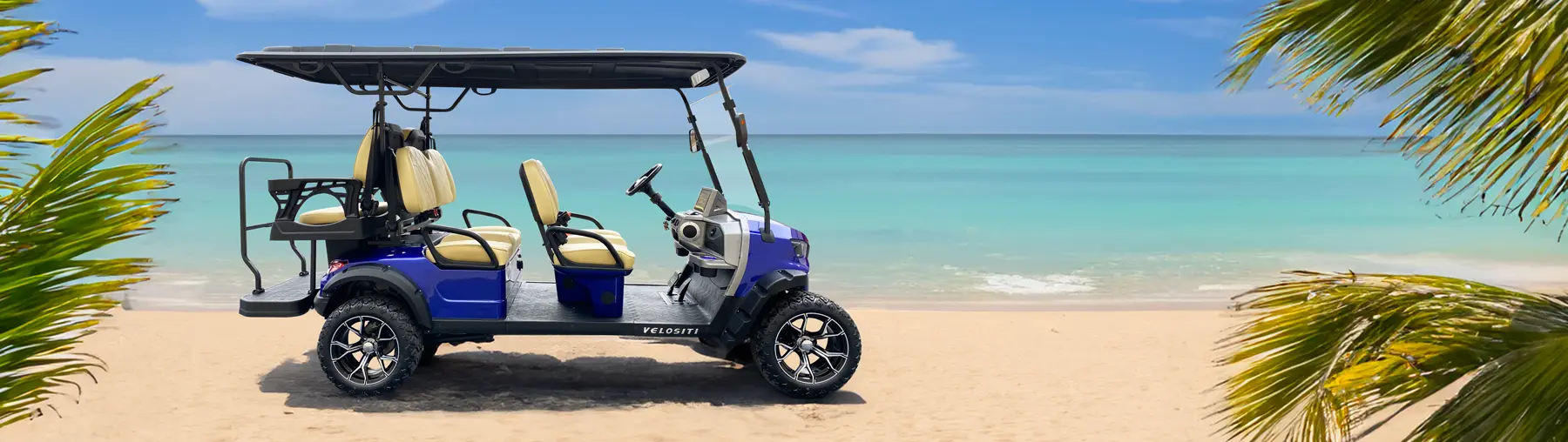 Four seat golf cart on sunny beach